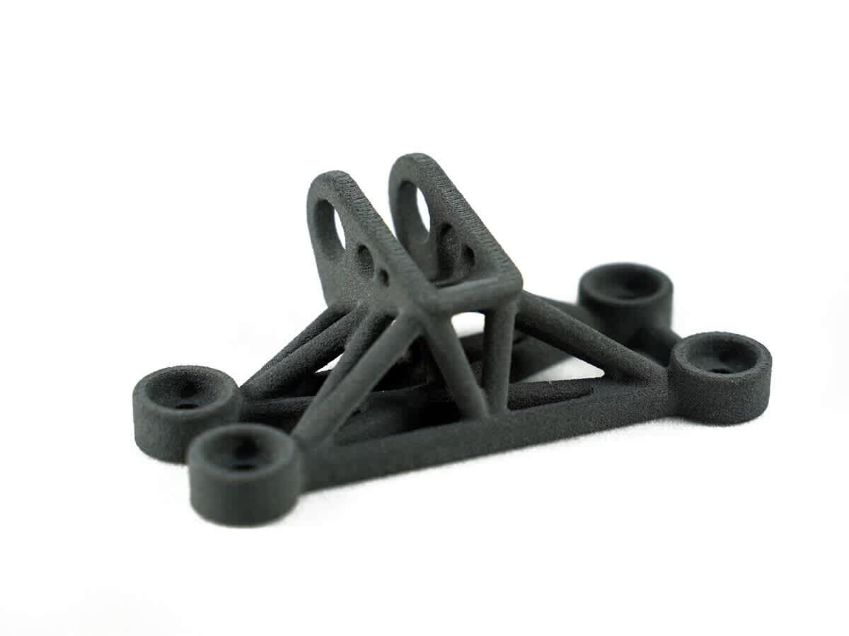 Black nylon SLS or MJF printed structural part with a matte textured finish