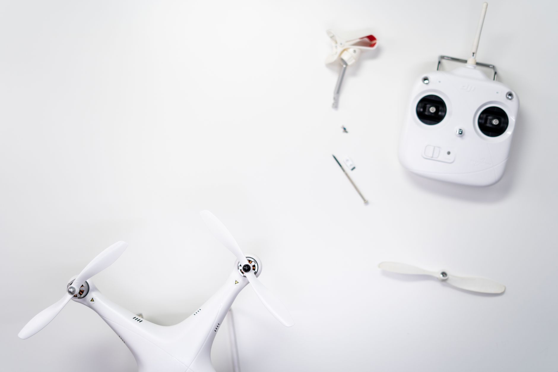 Drone kit with controller and spare propellers — example of precision 3D-printed functional parts