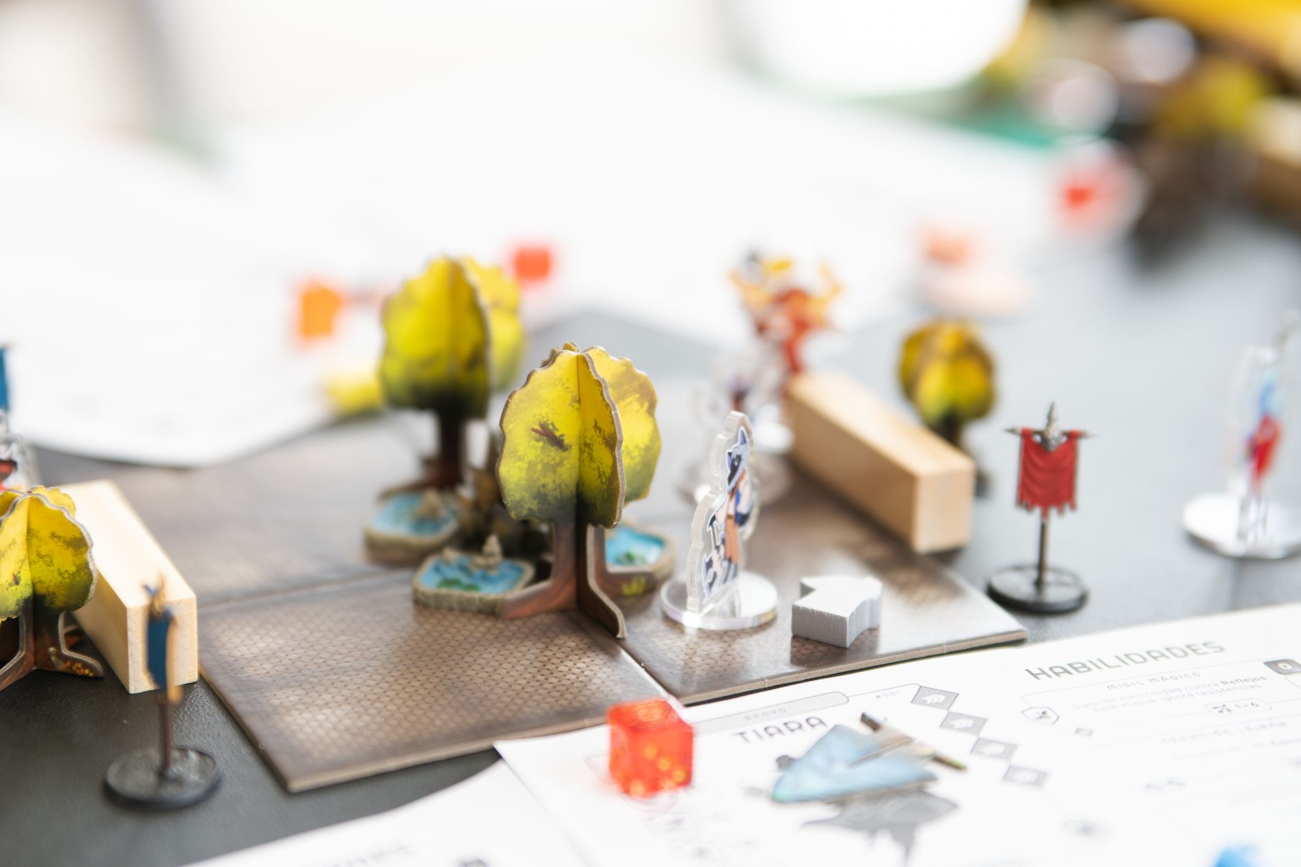 Painted tabletop role-playing game miniature figures and dice — example of full-color 3D printing